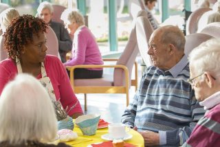 Image shown: Residents of St. Joseph’s Shankhill at a tea party event to celebrate the Fairland Collective